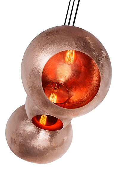 Modern sculptural hand made copper pendant lamp with a contemporary brown patina finish