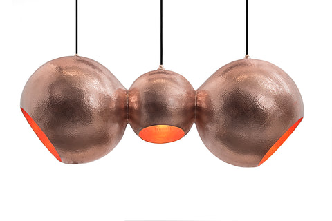 Modern sculptural hand made copper pendant lamp with a contemporary brown patina finish