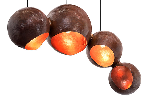 Modern sculptural hand made copper pendant lamp with a contemporary brown patina finish