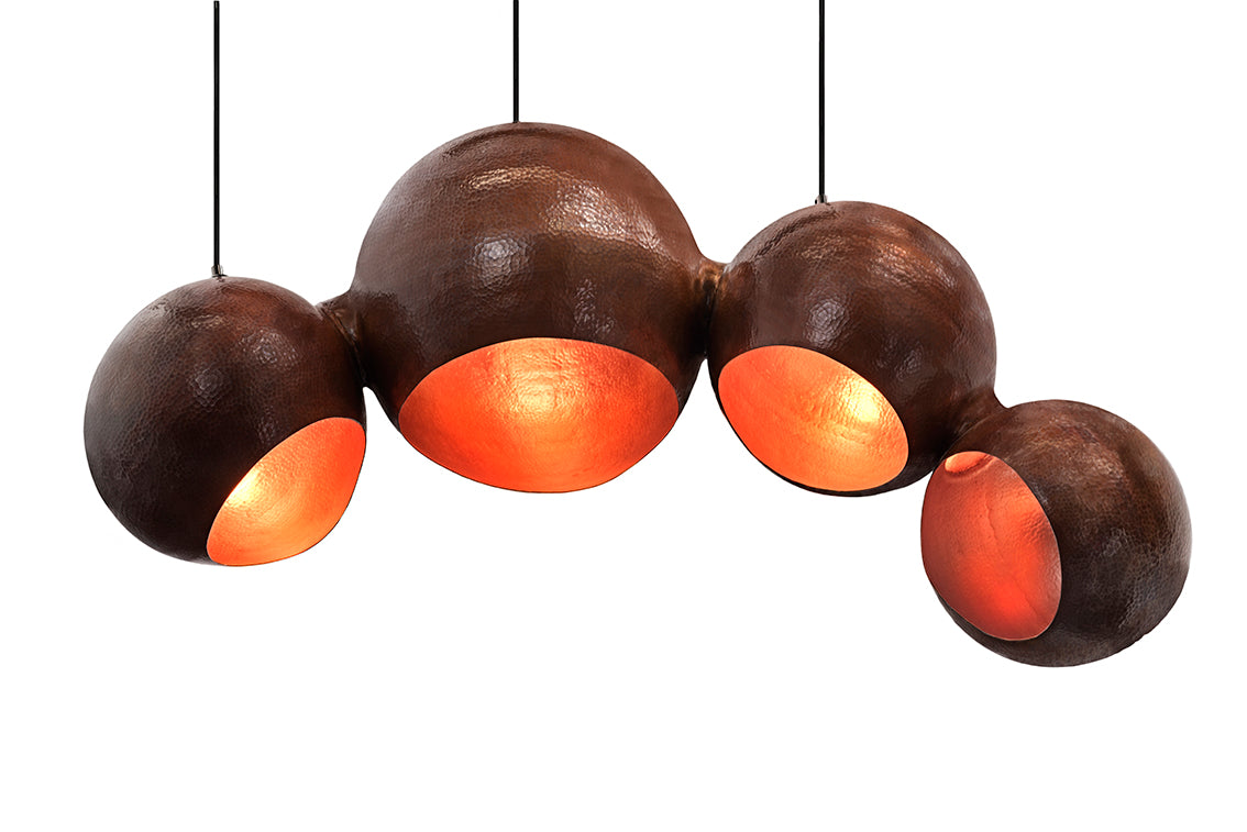 Modern sculptural hand made copper pendant lamp with a contemporary brown patina finish