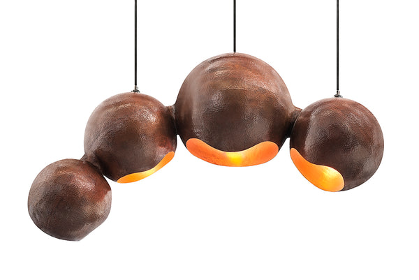 Modern sculptural hand made copper pendant lamp with a contemporary brown patina finish