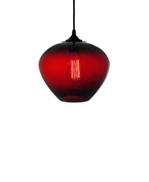 rounded hand blown glass pendant lamp in seductice ruby red